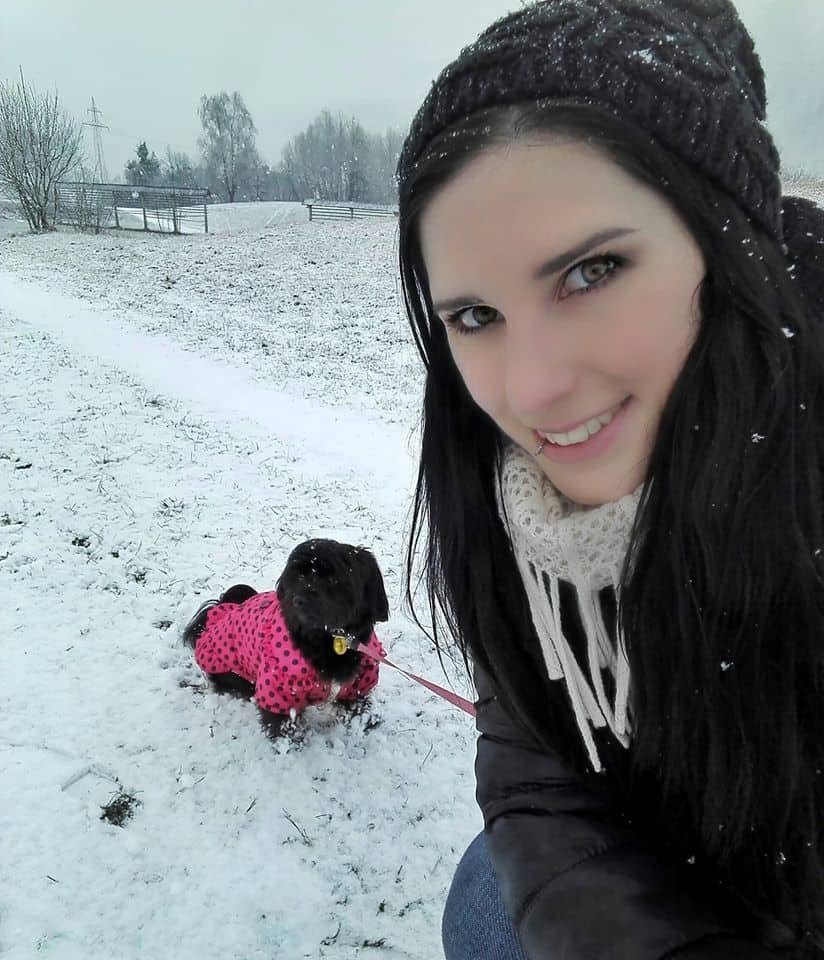 Petra from Big Income Paradise with her dog Ciara on a snowy day